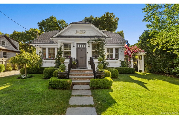 Welcome to 418 Pine Acres Boulevard one of the most charming homes in the village!