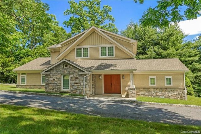 Stone  and Shingle Cape Style Home