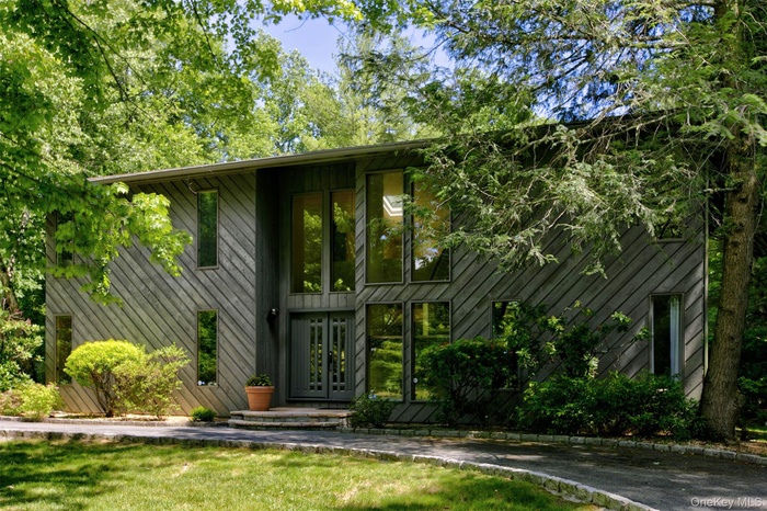 Welcome to 1 Sassi Drive, a stunning contemporary residence showcasing exceptional architectural details throughout. Thoughtfully designed to balance 