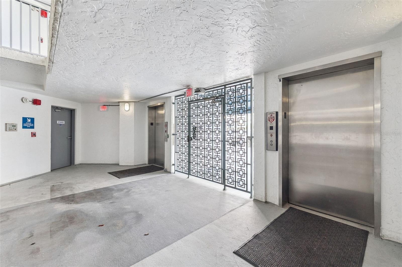 Two elevators and gated entry