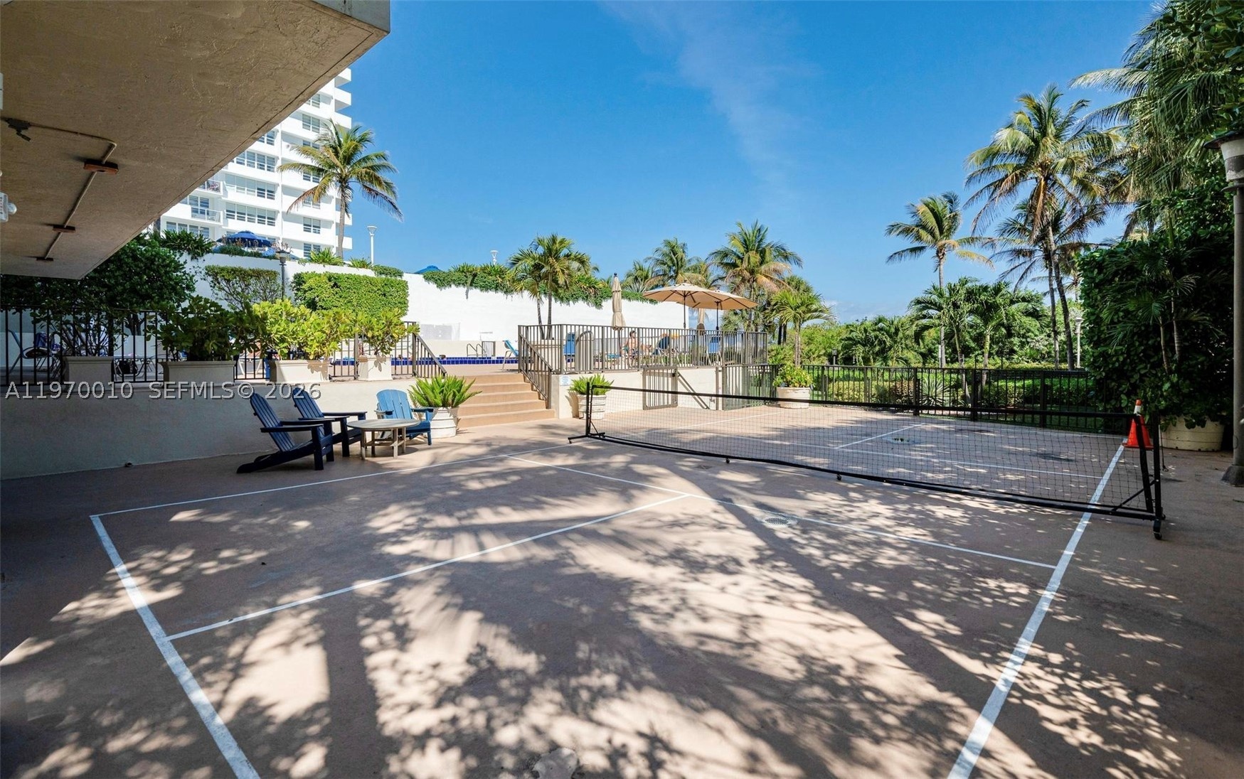 Pickle-ball yard, pool area and garden