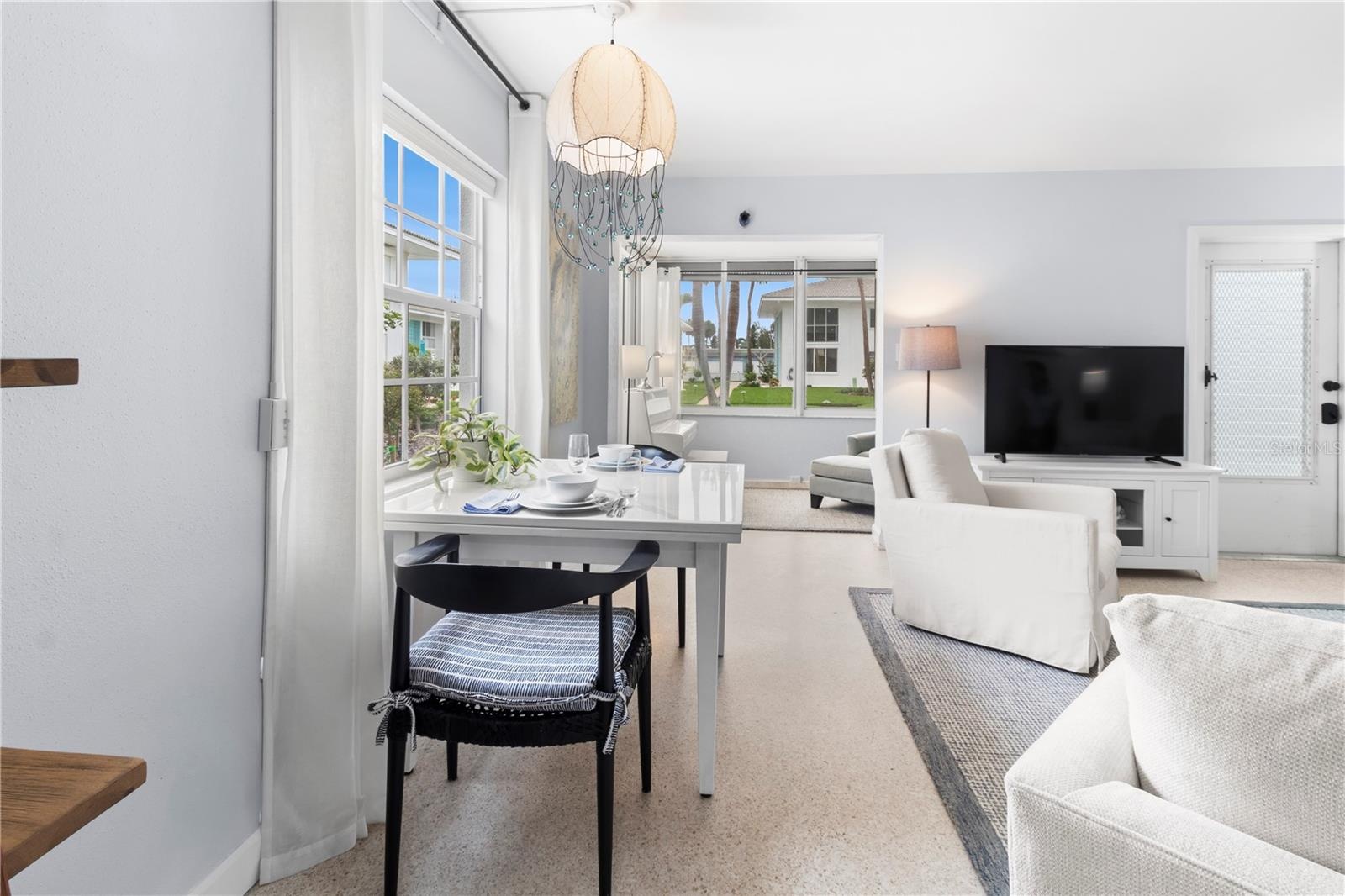 View of dining area and sunroom from Kitchen