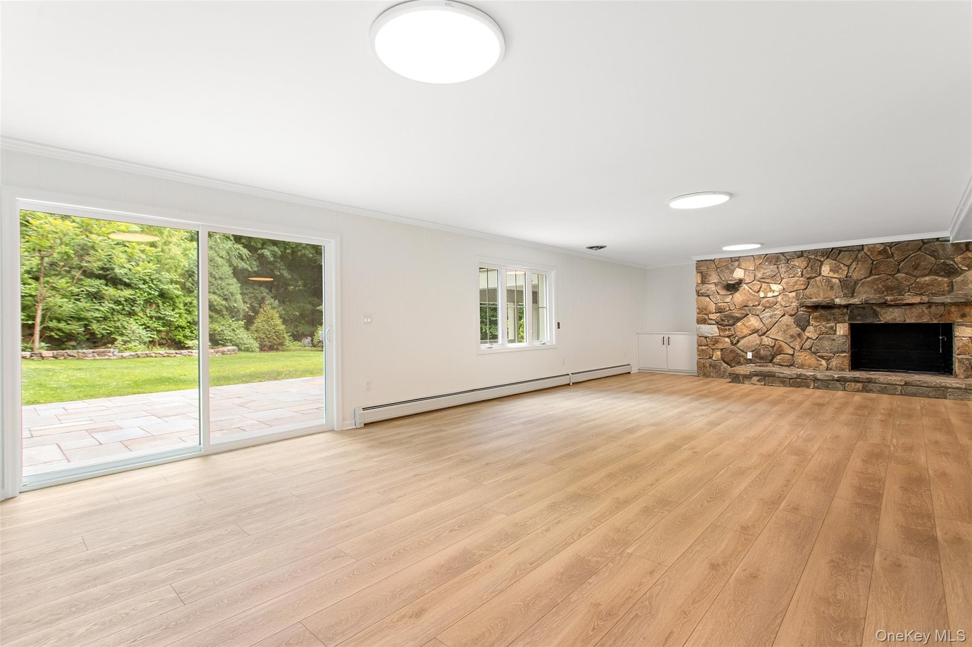 Family room with stone fireplace