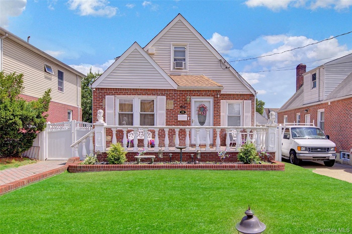 Brick and siding exterior with a pitched roof