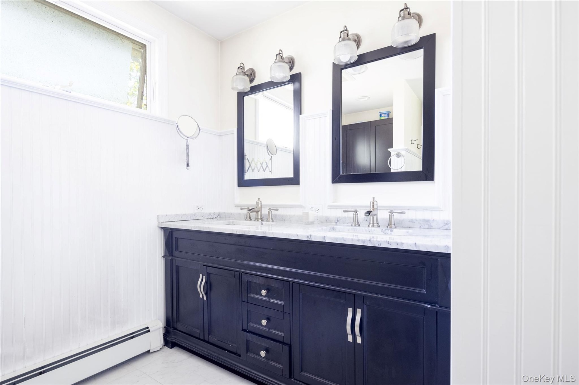 Double sinks with marble counter