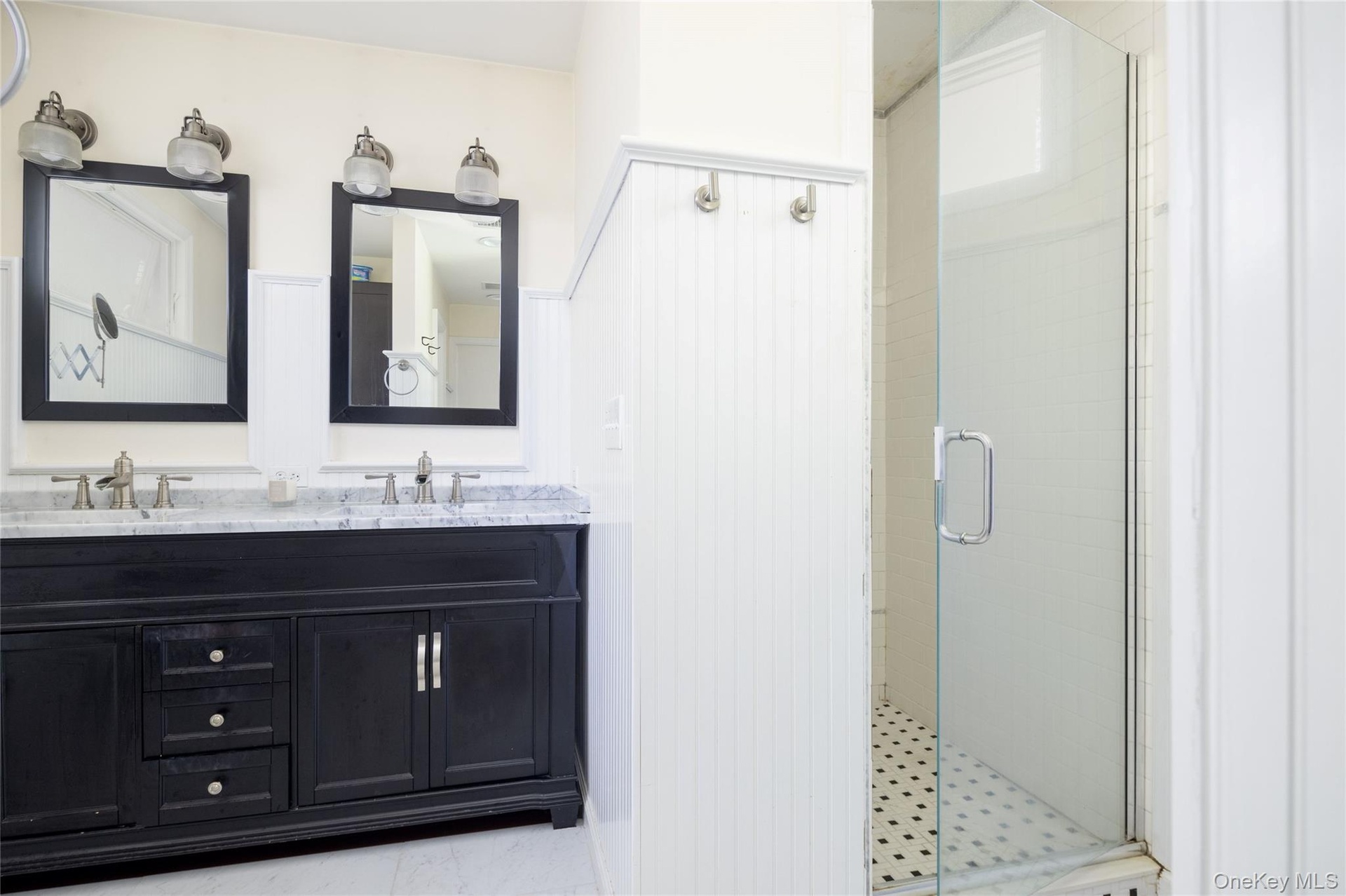 Glass shower enclosure