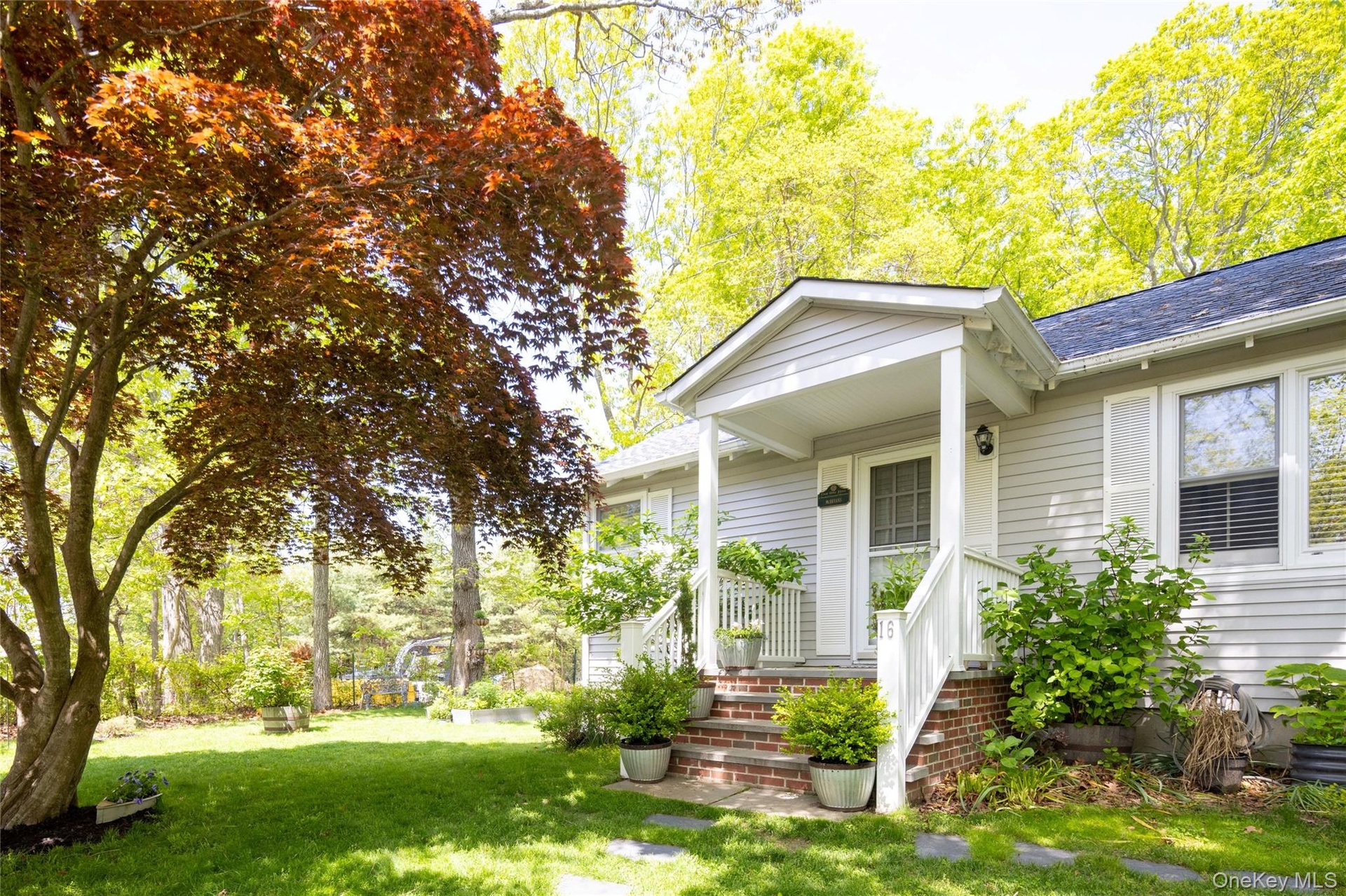 Covered front stone entranceway