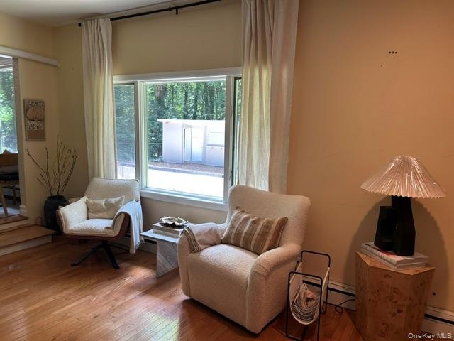 Situated off the kitchen and dining room. this area provides a view to the yard.