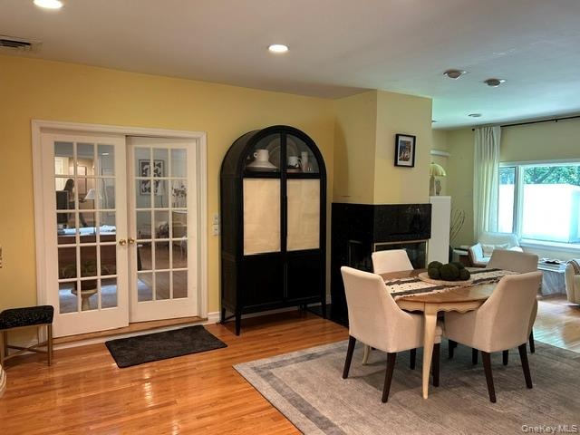 Decorative Glass Doors welcome you into the Dining Room