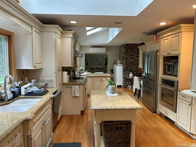 Full view of an expansive kitchen with removable island