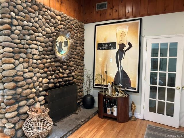 Feel the warmth from this rustic stone fireplace.