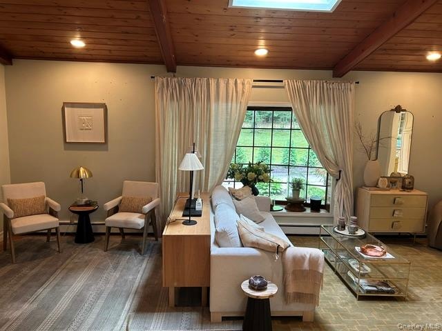 This sitting area is located in front of the fireplace, a great place to relax