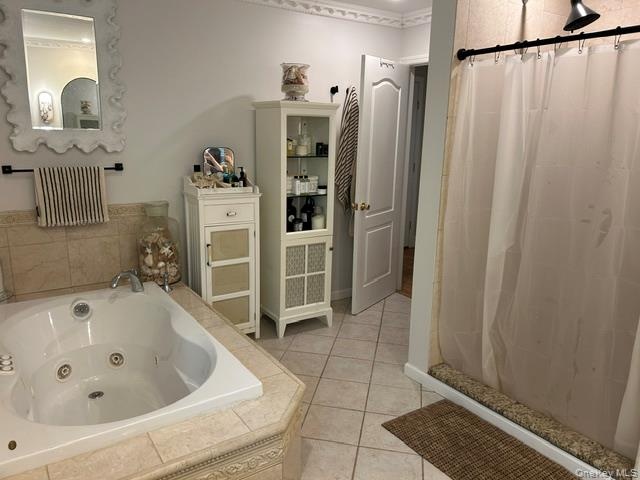 Whirlpool and separate shower