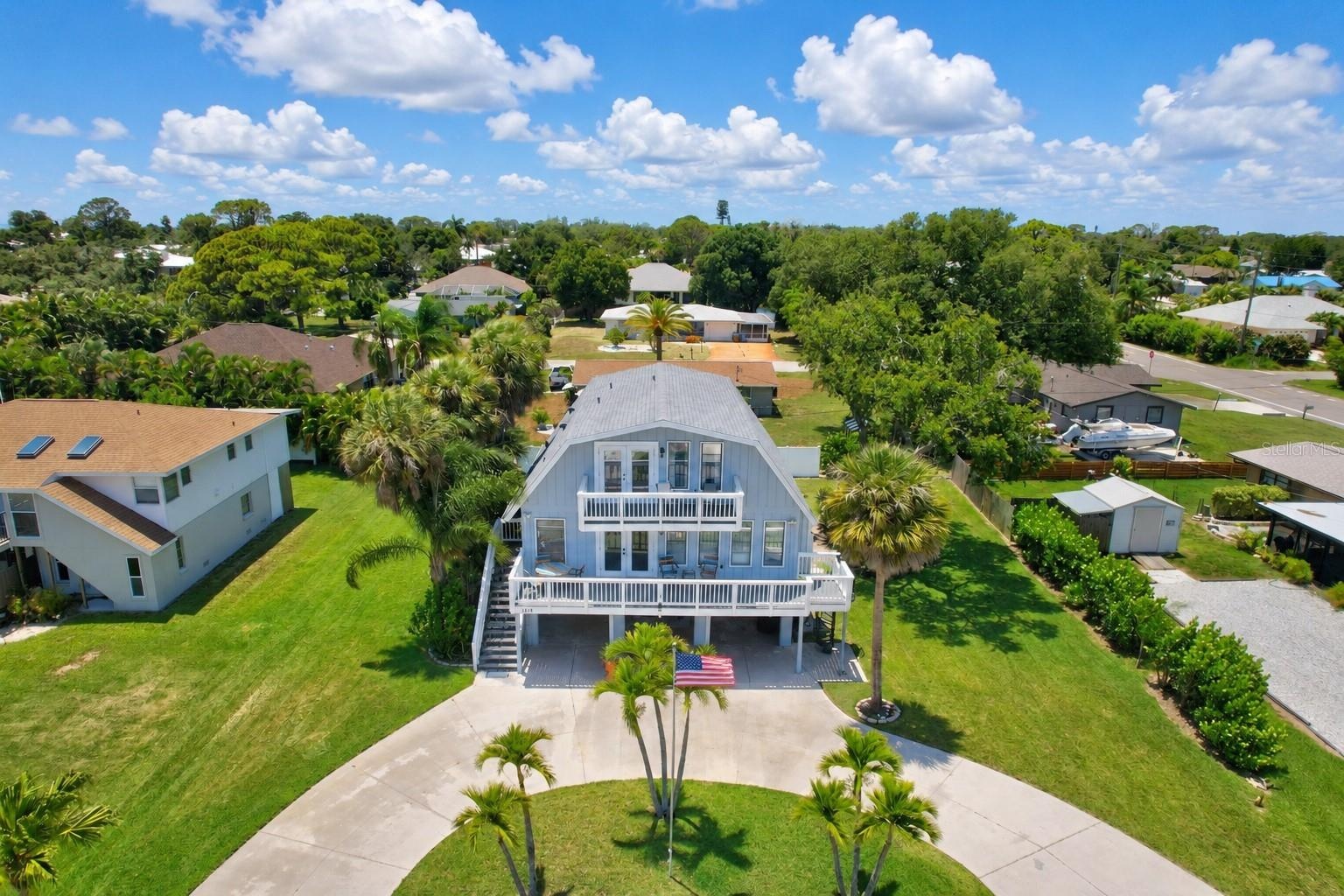 Aerial front view of the Home with Circular Drive