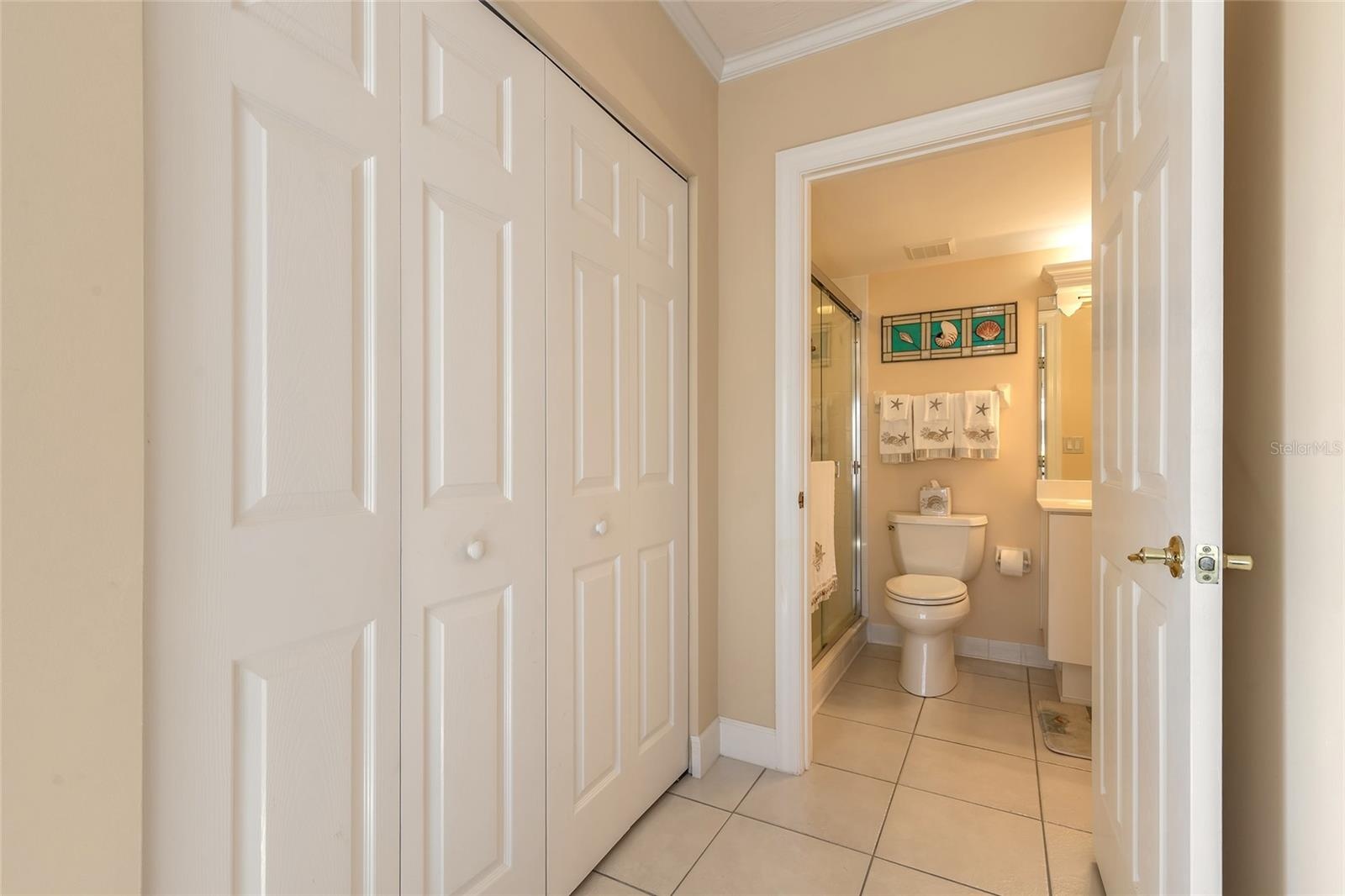 Guest bedroom has its own bathroom with shower