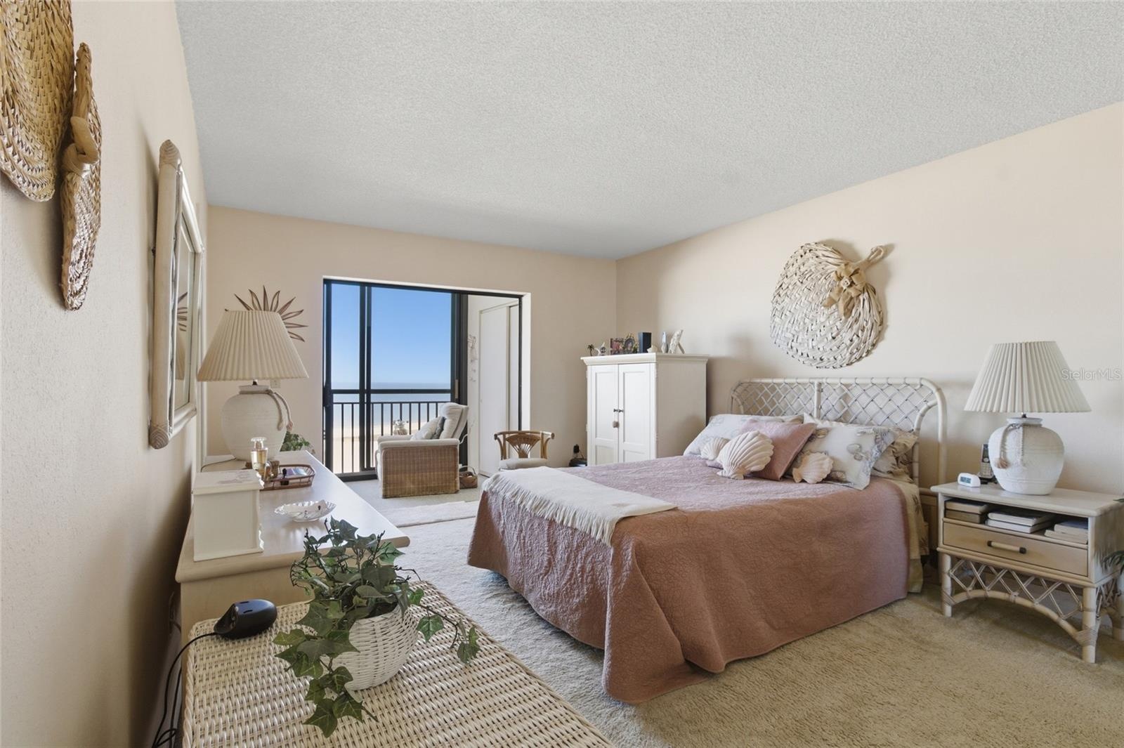 Primary Bdrm with sliders to enclosed patio