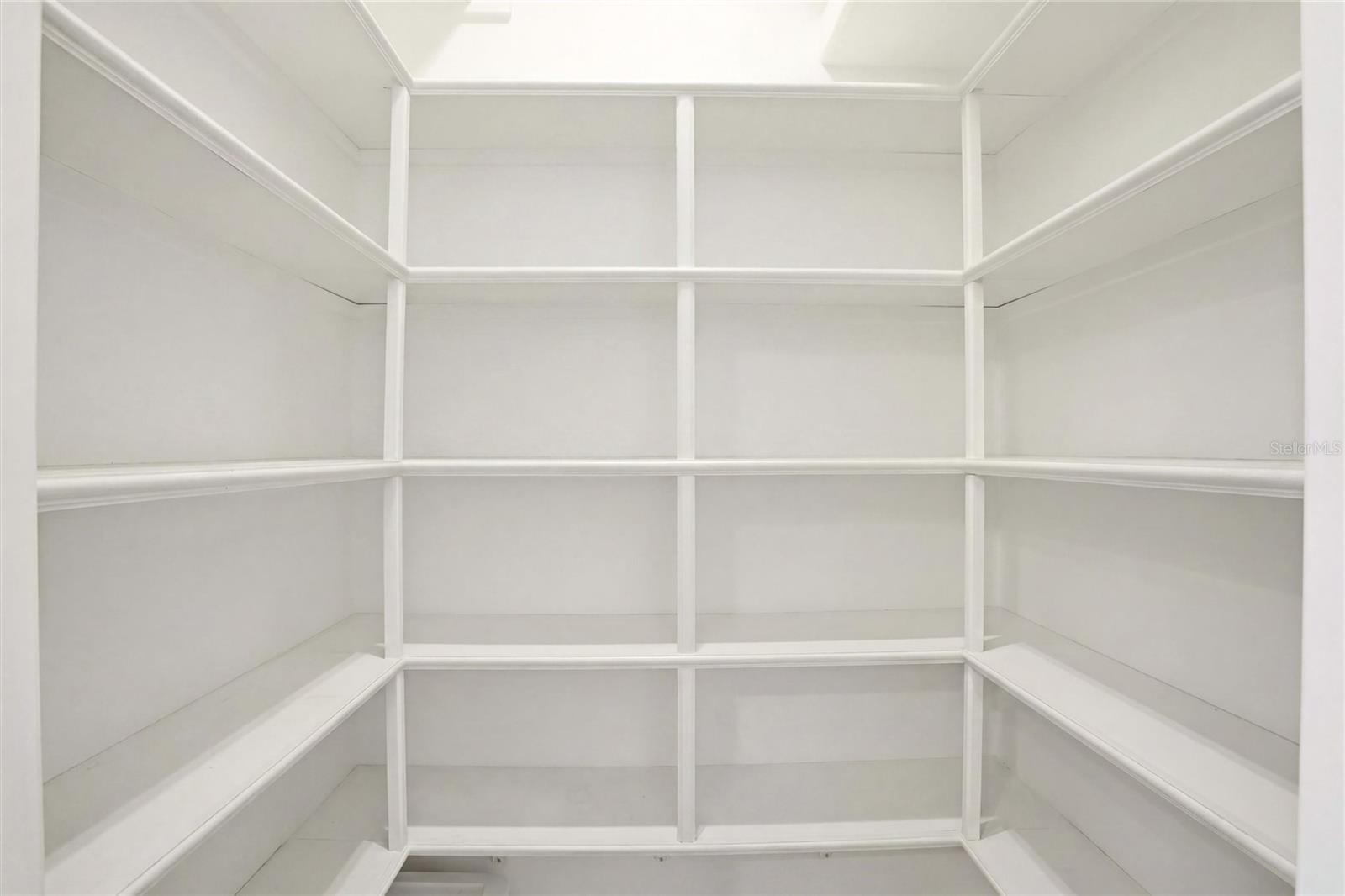 Pantry enclosed by glass doors
