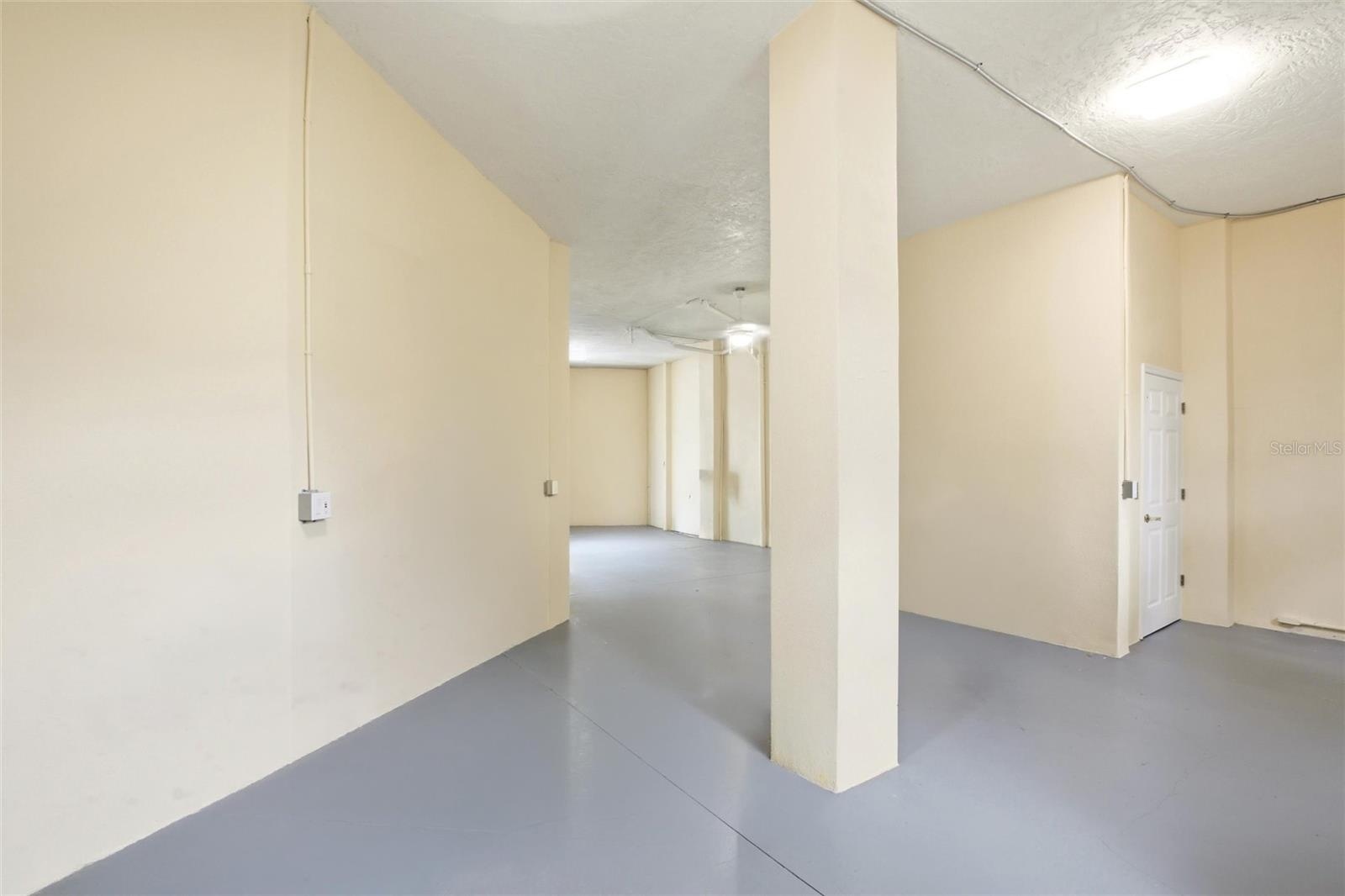Ground level storage and elevator