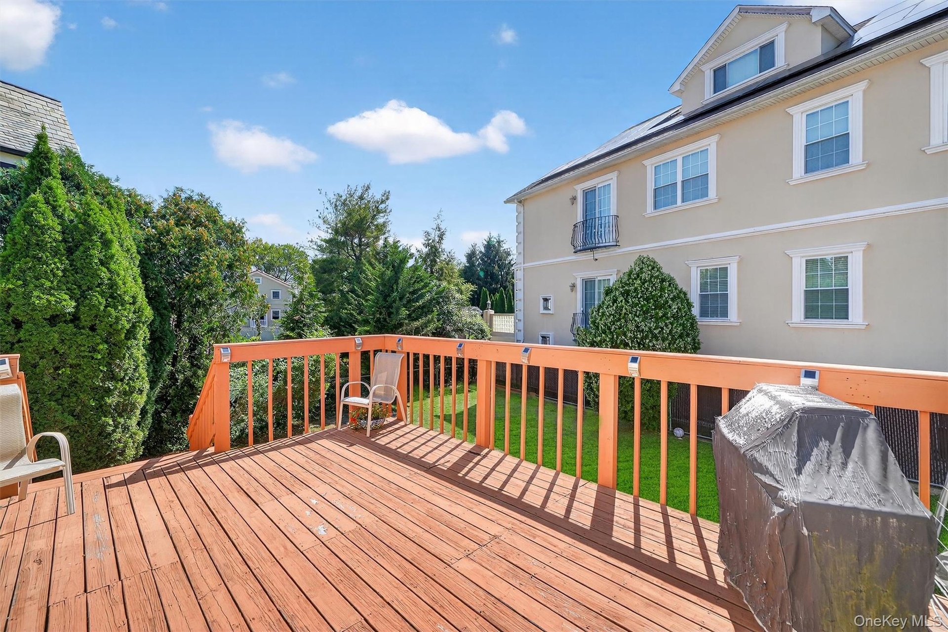 Deck featuring a lawn