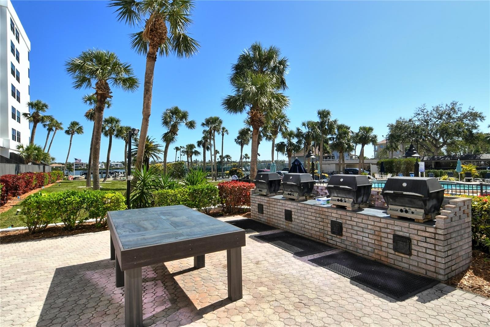 4 Gas Grills on Grilling Patio