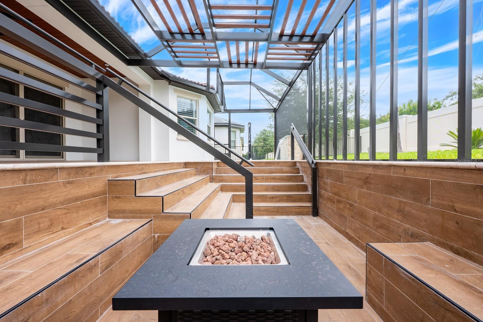 Custom built-in seating with fire pit.