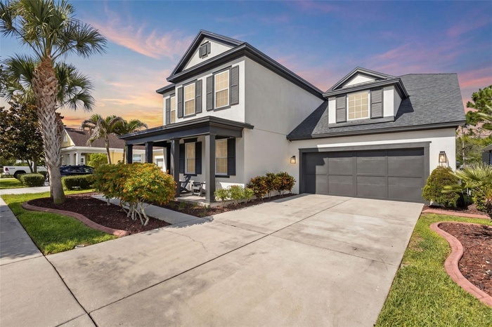 Rare Ashton Woods Ferrara floor plan in Asturia with pond views, fenced backyard, and 2,890 sq ft of thoughtfully designed living space