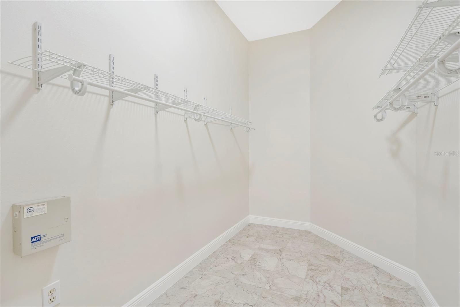 Large walk-in closet primary bedroom
