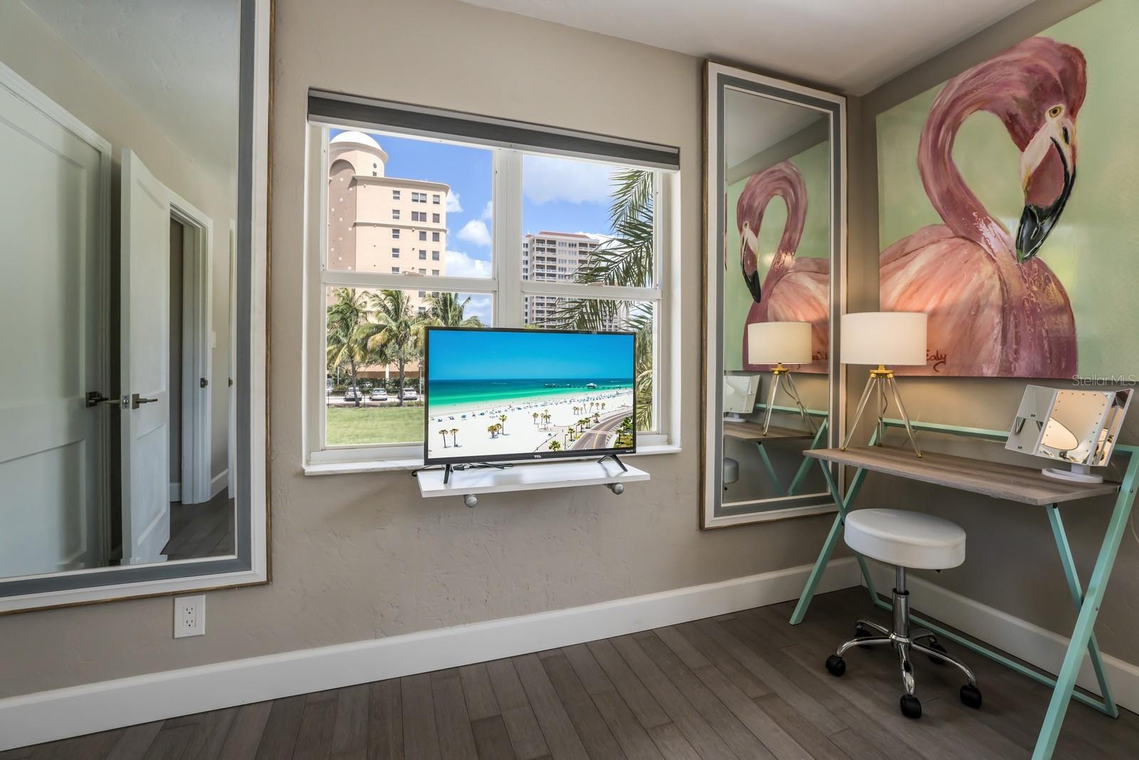 #2 Upstairs Left - has private patio and partial views of the Bay. Also, Evolution is now on what you see is the vacant lot.