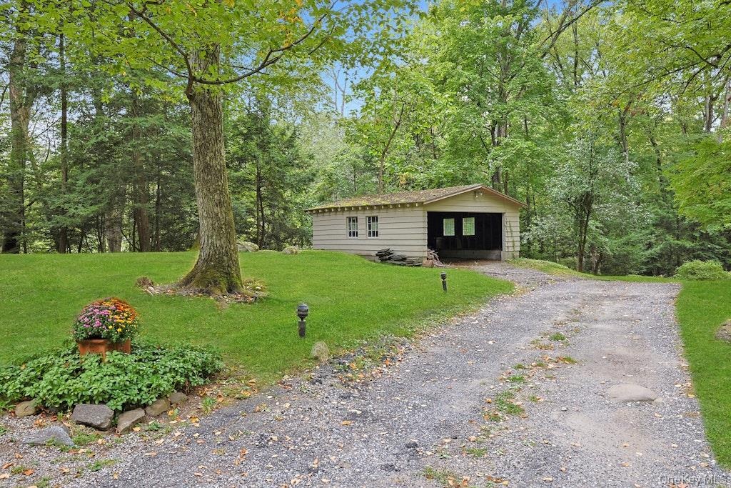 A second garage sized shed...want an ATV?