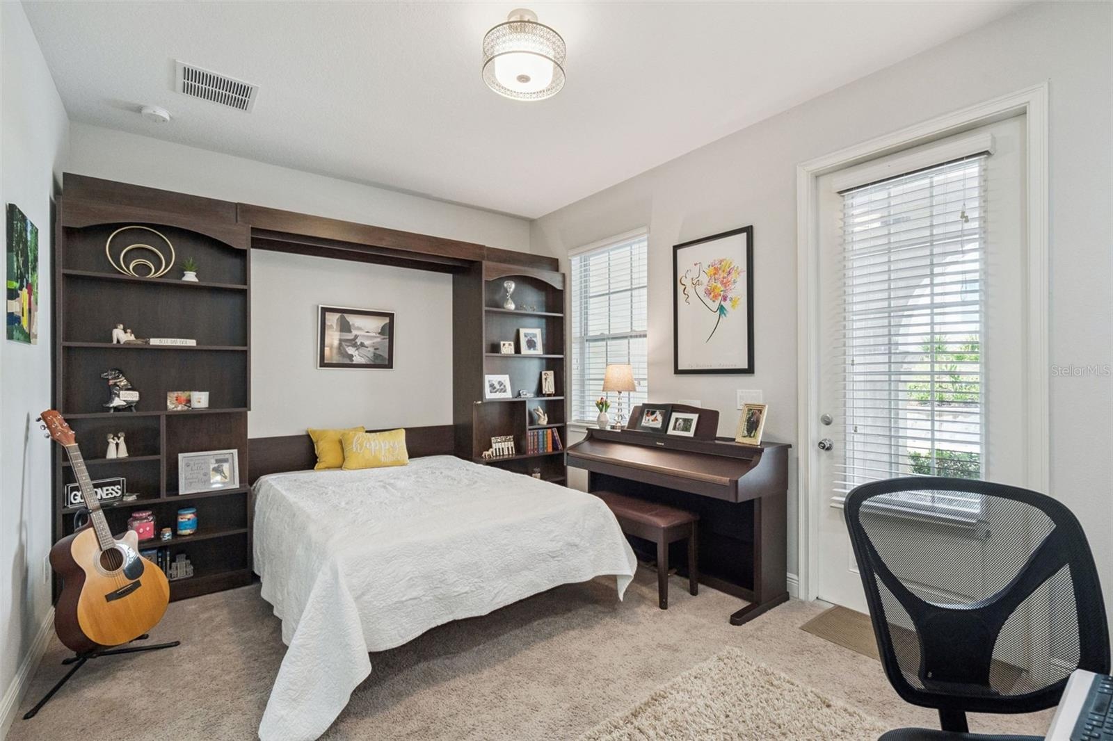 4th bedroom with access to lower patio