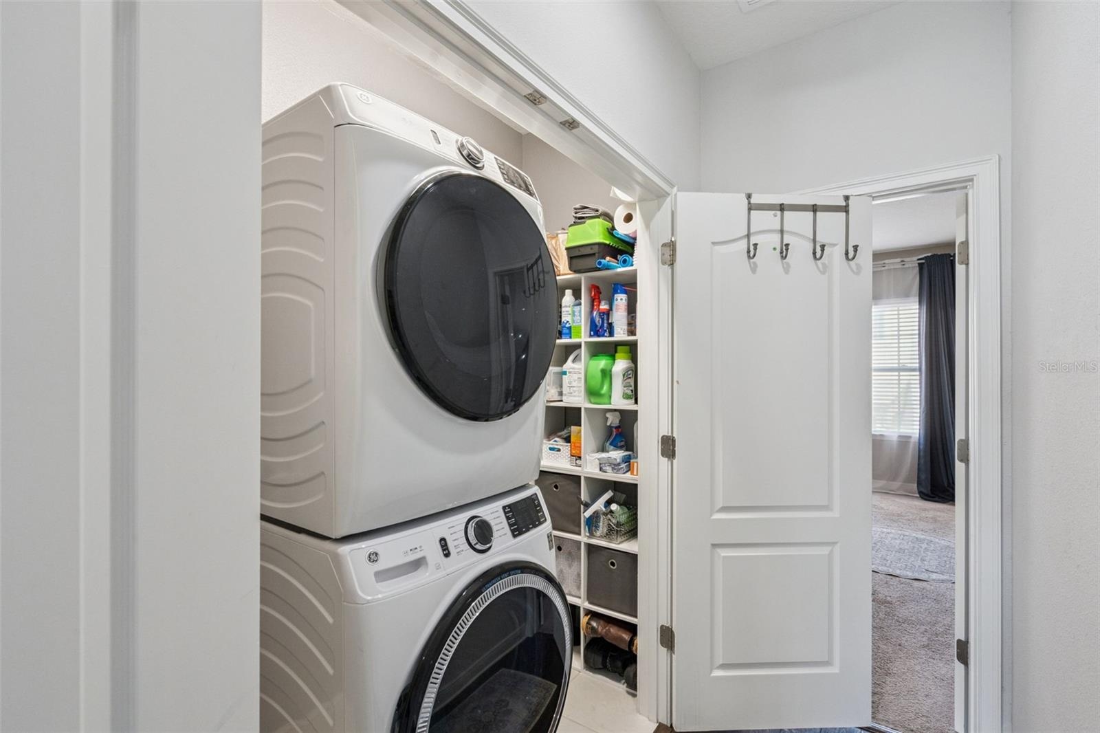 Laundry room with upgraded washer/dryer