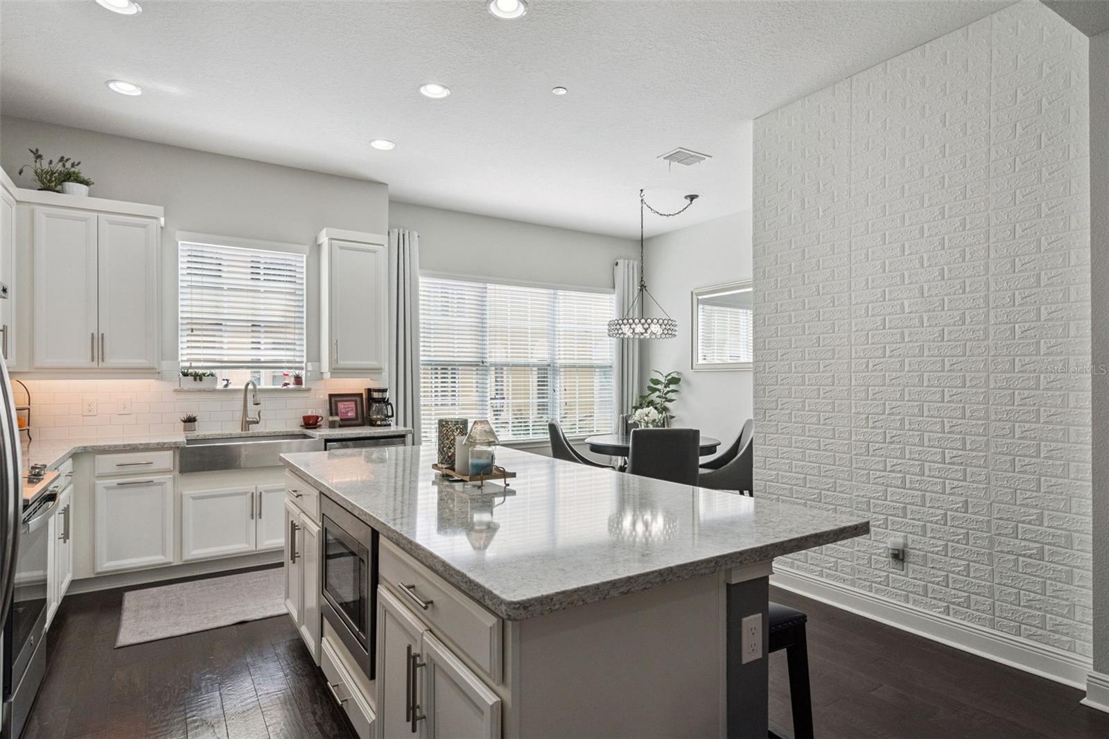 Kitchen island with microwave drawer