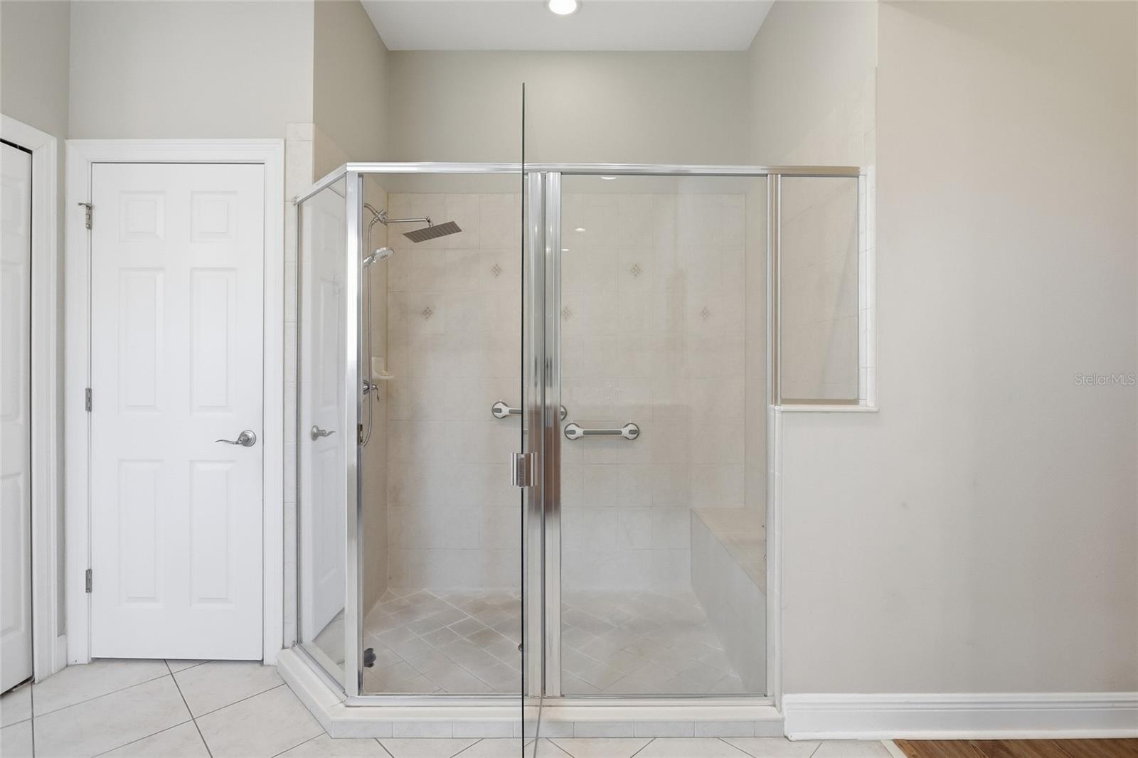 Walk-in shower and water closet in the primary bathroom