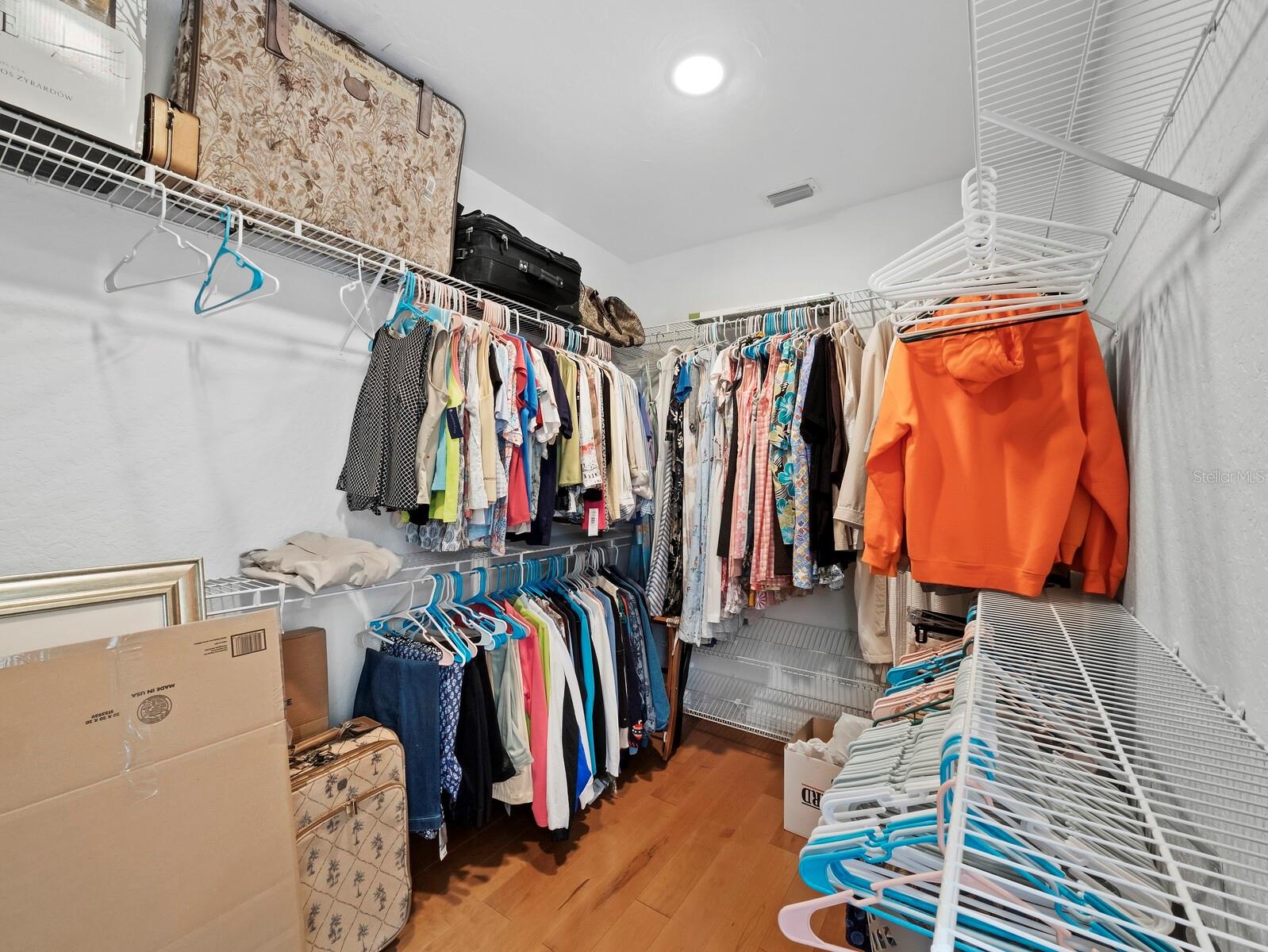 The large, walk-in primary closet