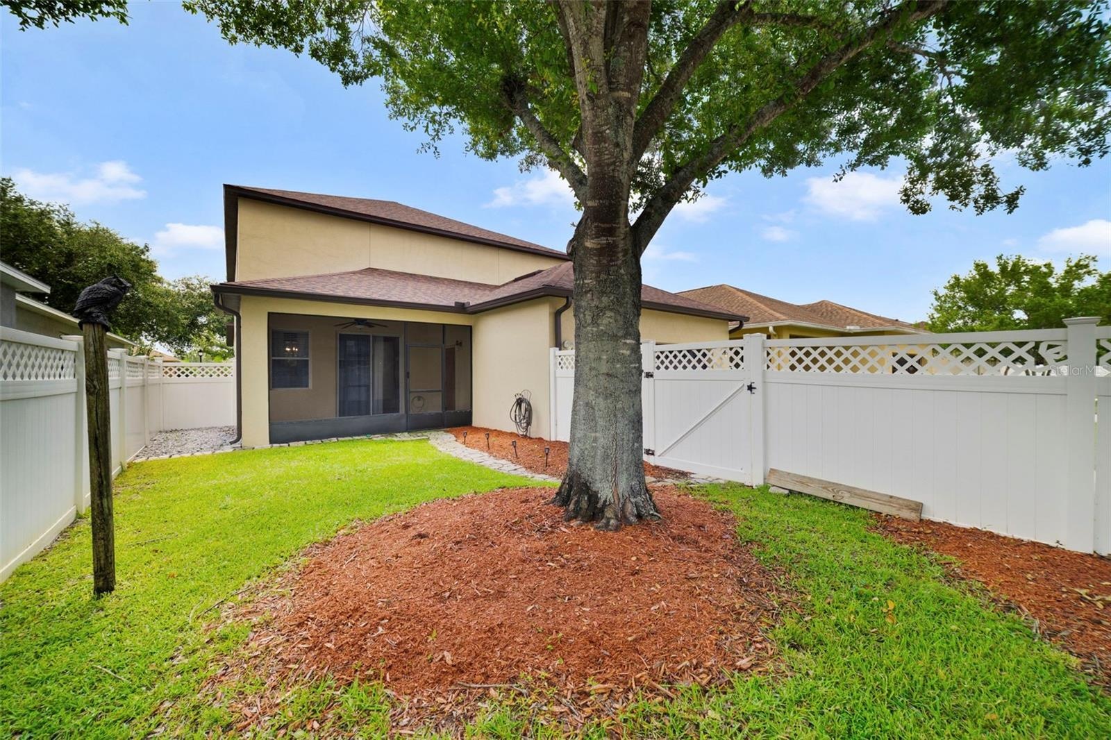 Fenced yard space, 2-car rear facing garage.