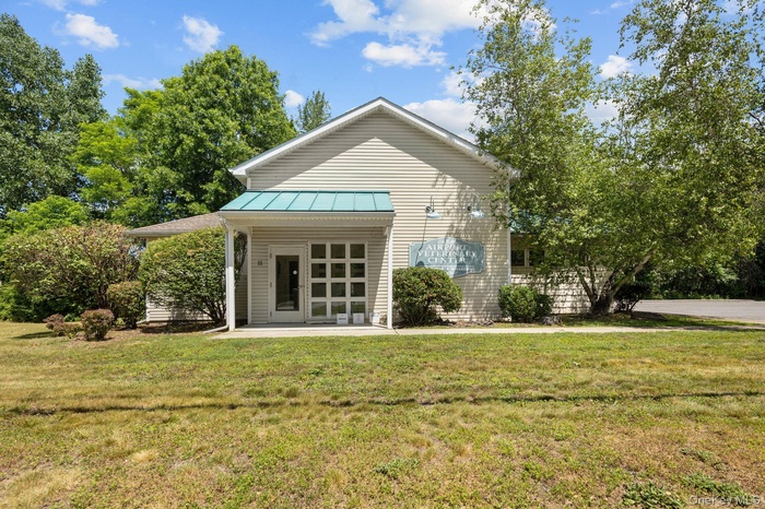 Welcome to 11 Airport Rd-a professional building located at the intersection of Route 376 and  Airport Rd