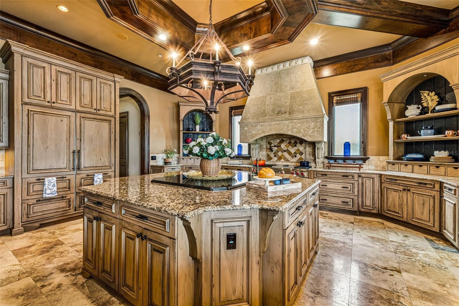 Kitchen with a grand island perfect for hosting & entertaining!