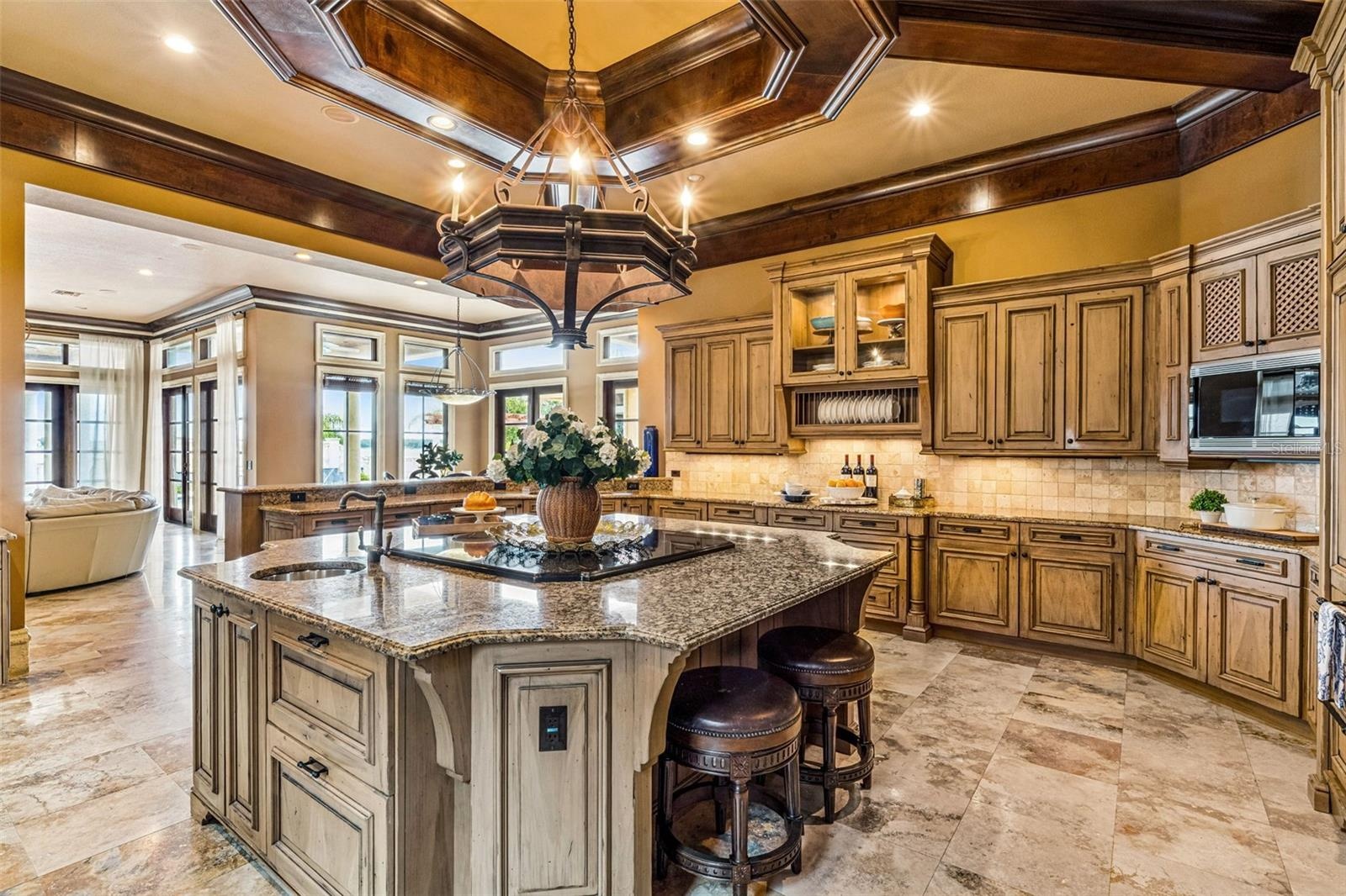 Kitchen with a grand island perfect for hosting & entertaining!