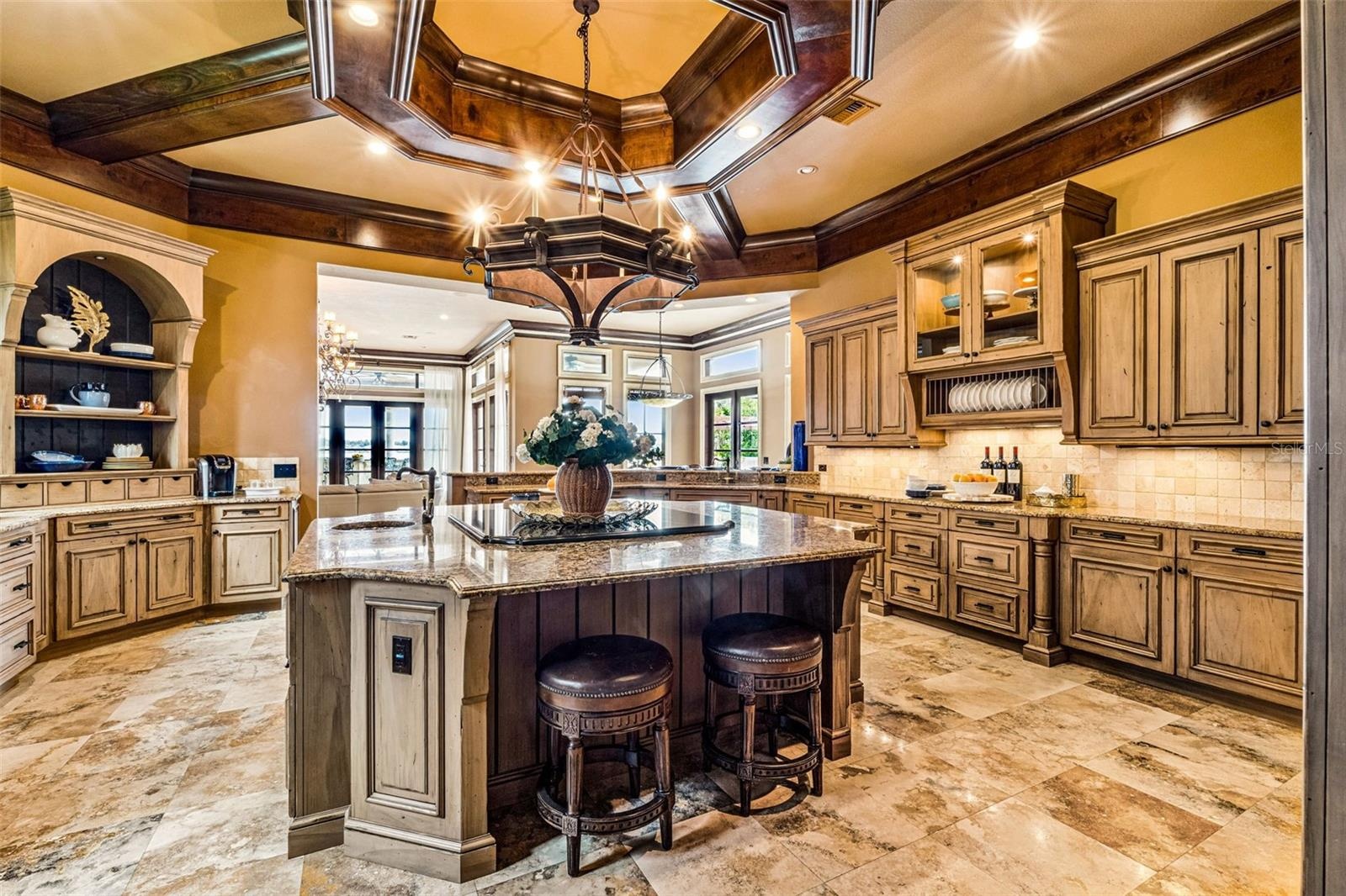 Kitchen with a grand island perfect for hosting & entertaining!