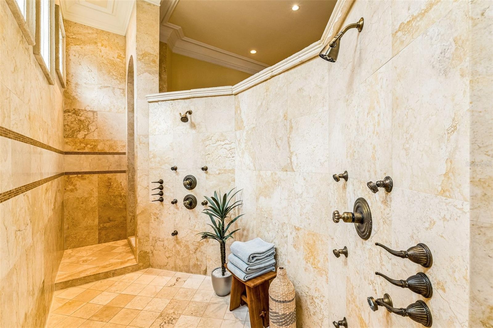 Dual Shower heads with body sprayers to provide resort-like hydrotherapy experiences.
