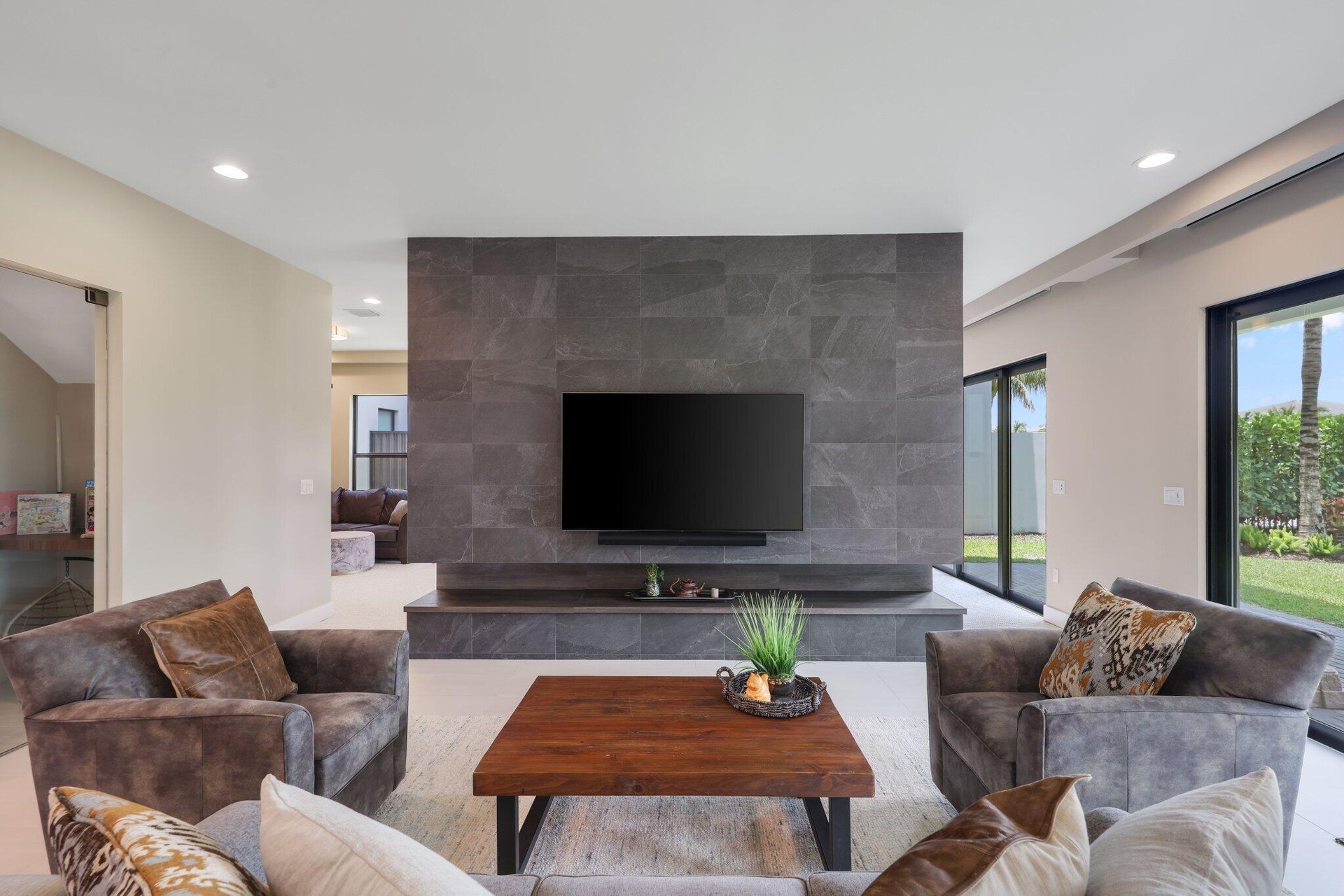 Extended feature wall, tiled on both sides.