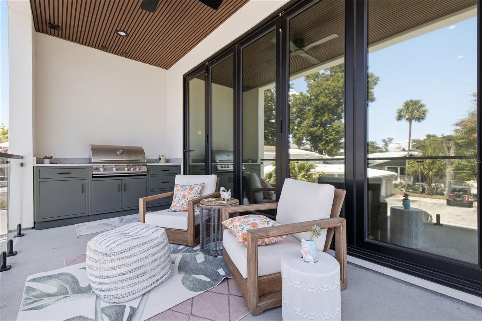 Patio on second floor with outdoor grill