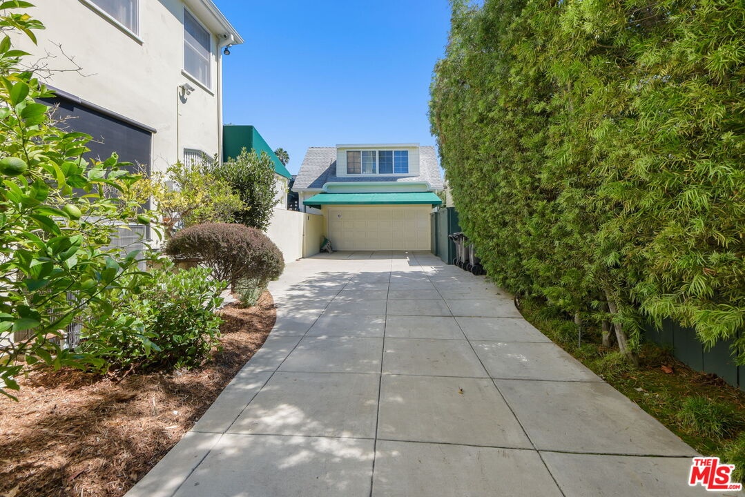 Gated driveway to garage