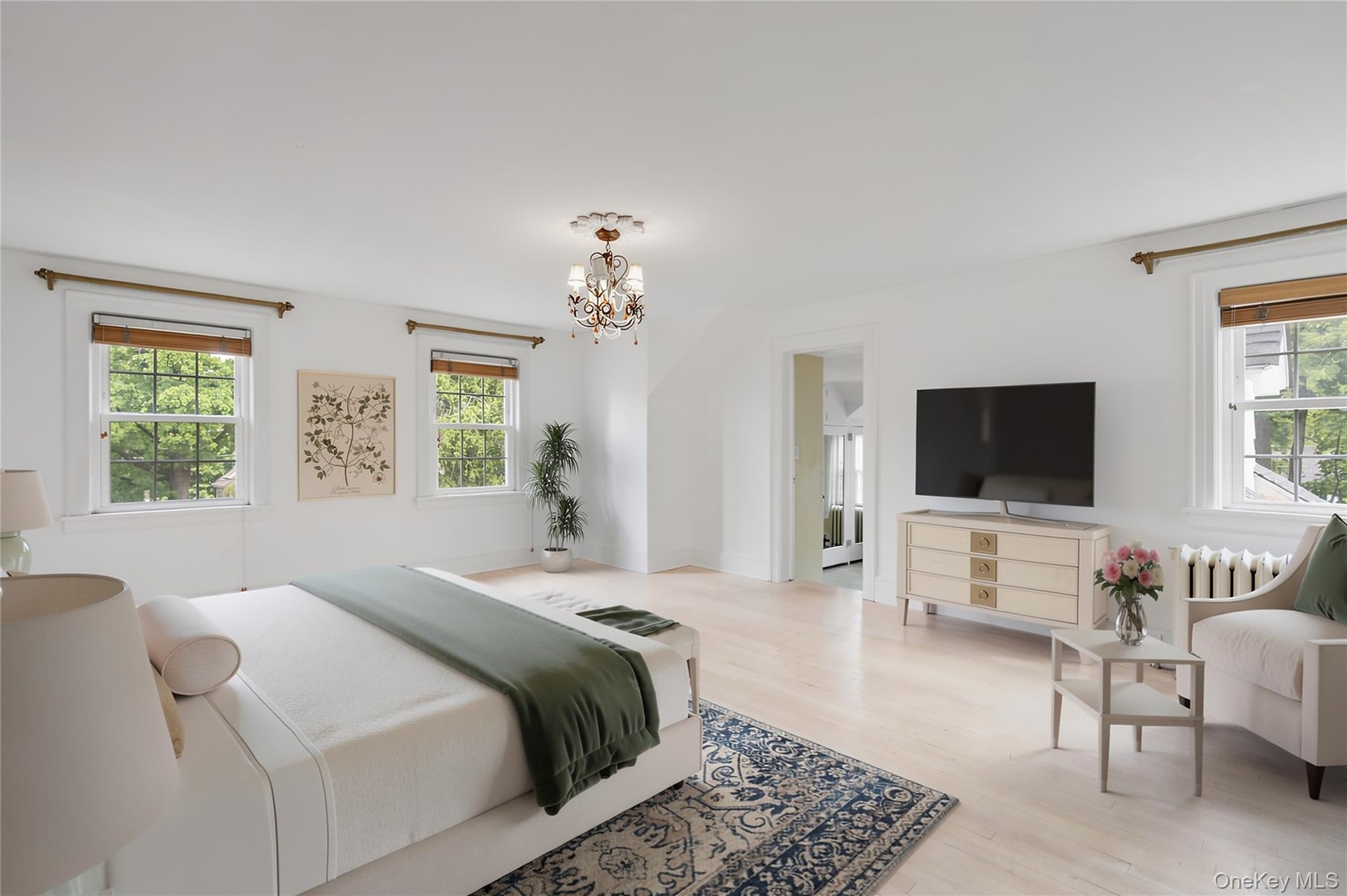 Spacious primary bedroom with bath