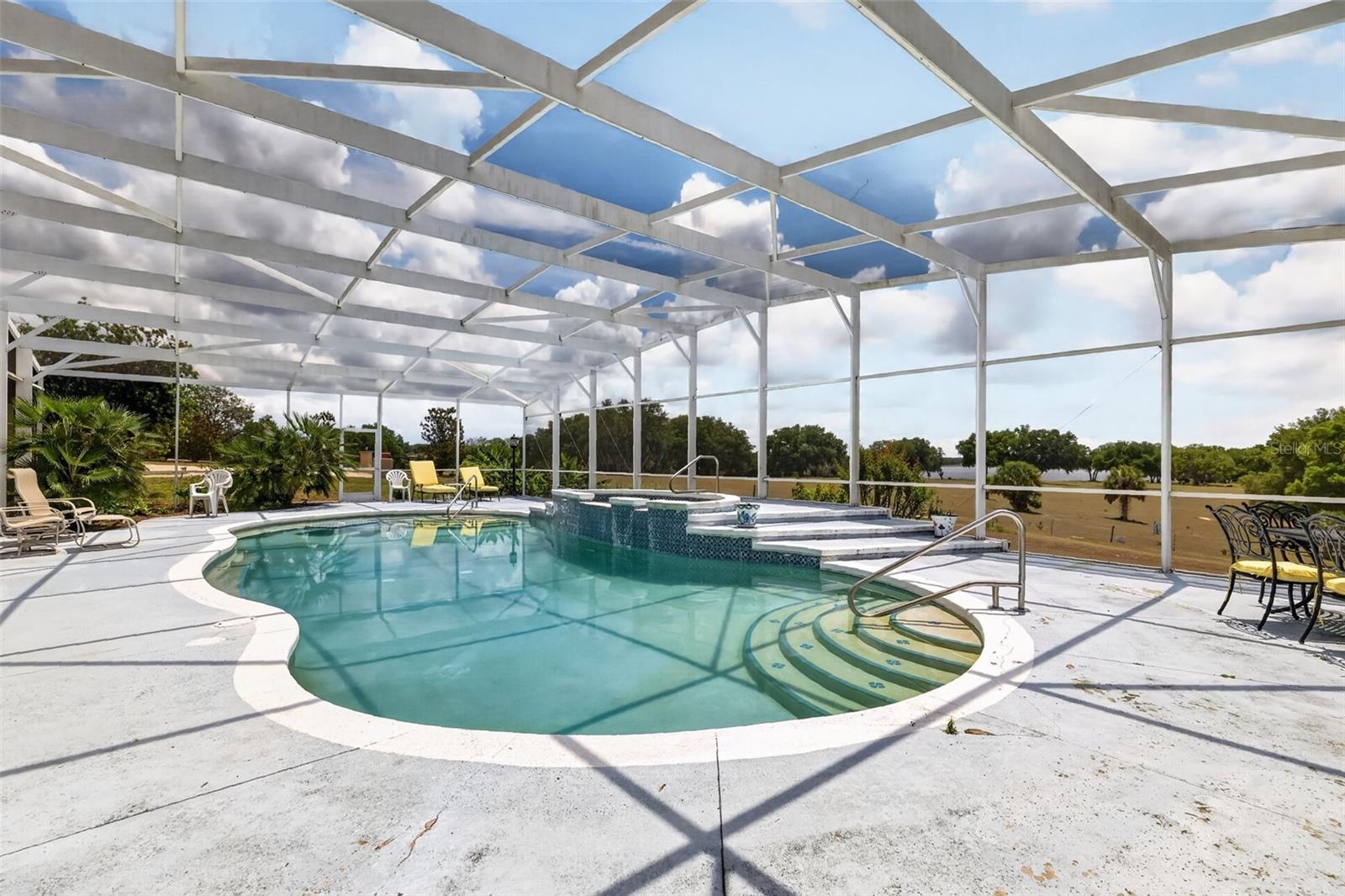 Screen Enclosed Heated Pool and Spa
