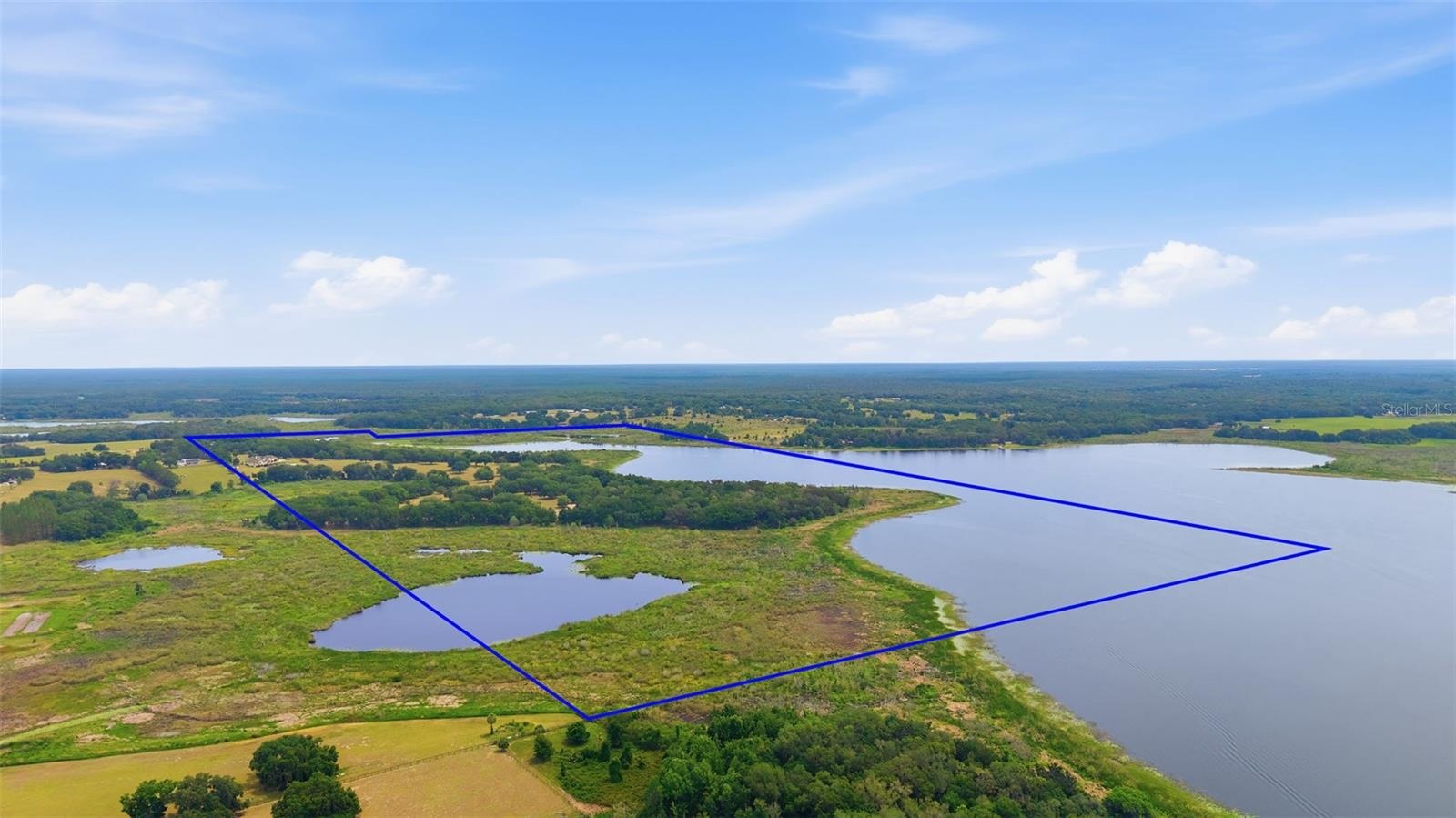 Aerial View of Property with outline from the south