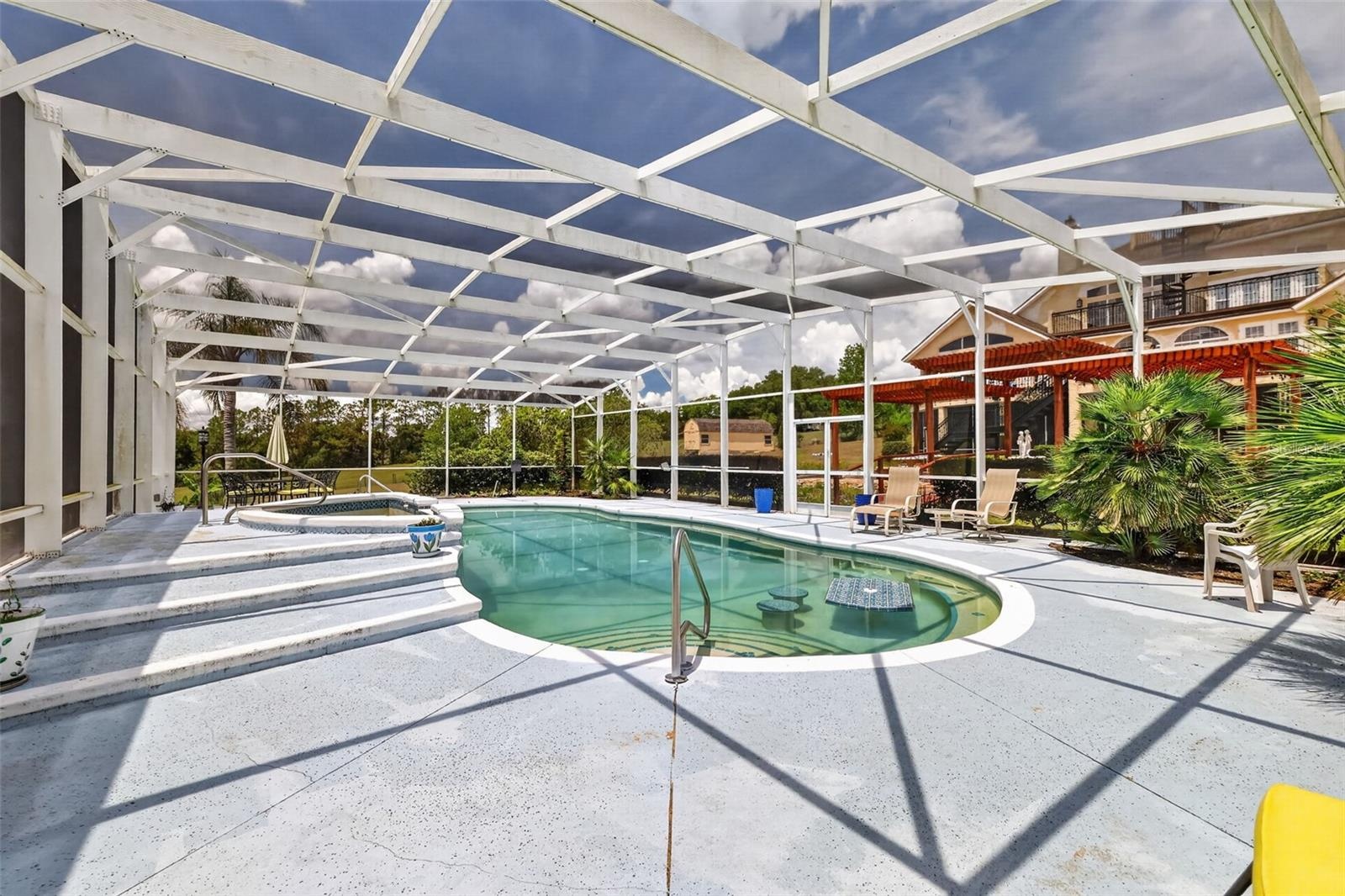 Screen Enclosed Heated Pool and Spa