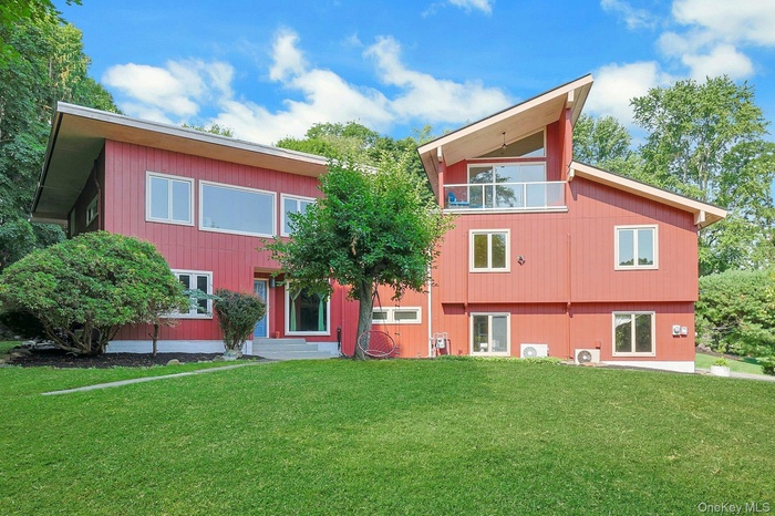 Stunning Hudson River views, gorgeous modern updates and a dream pool  - all to be found in this Hudson Highlands retreat at 6 Grandview Avenue.