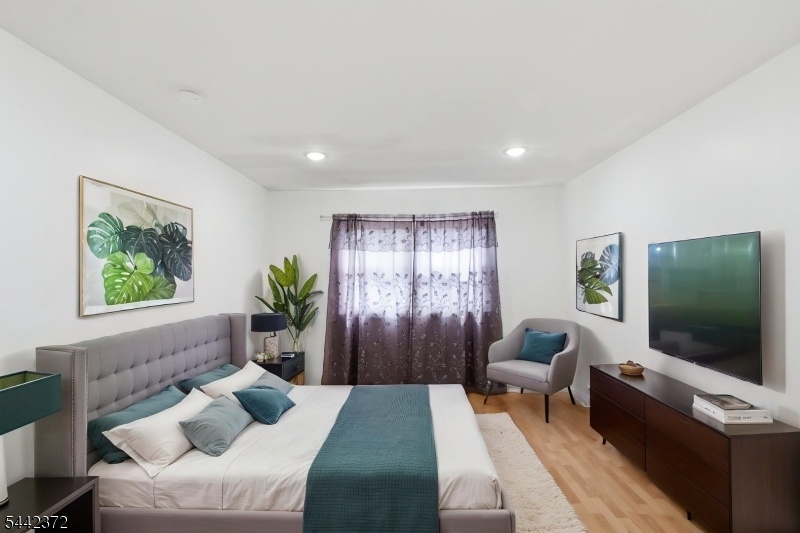 Bedroom 1 (virtually staged)