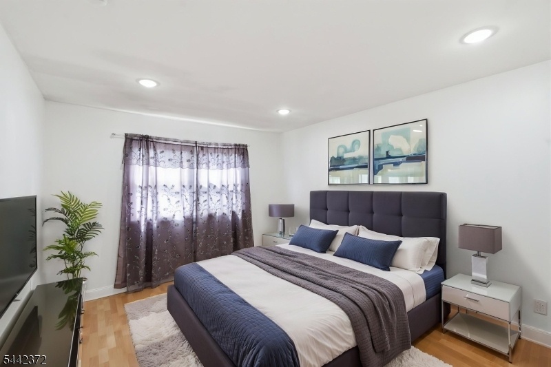 Bedroom 1 (virtually staged)